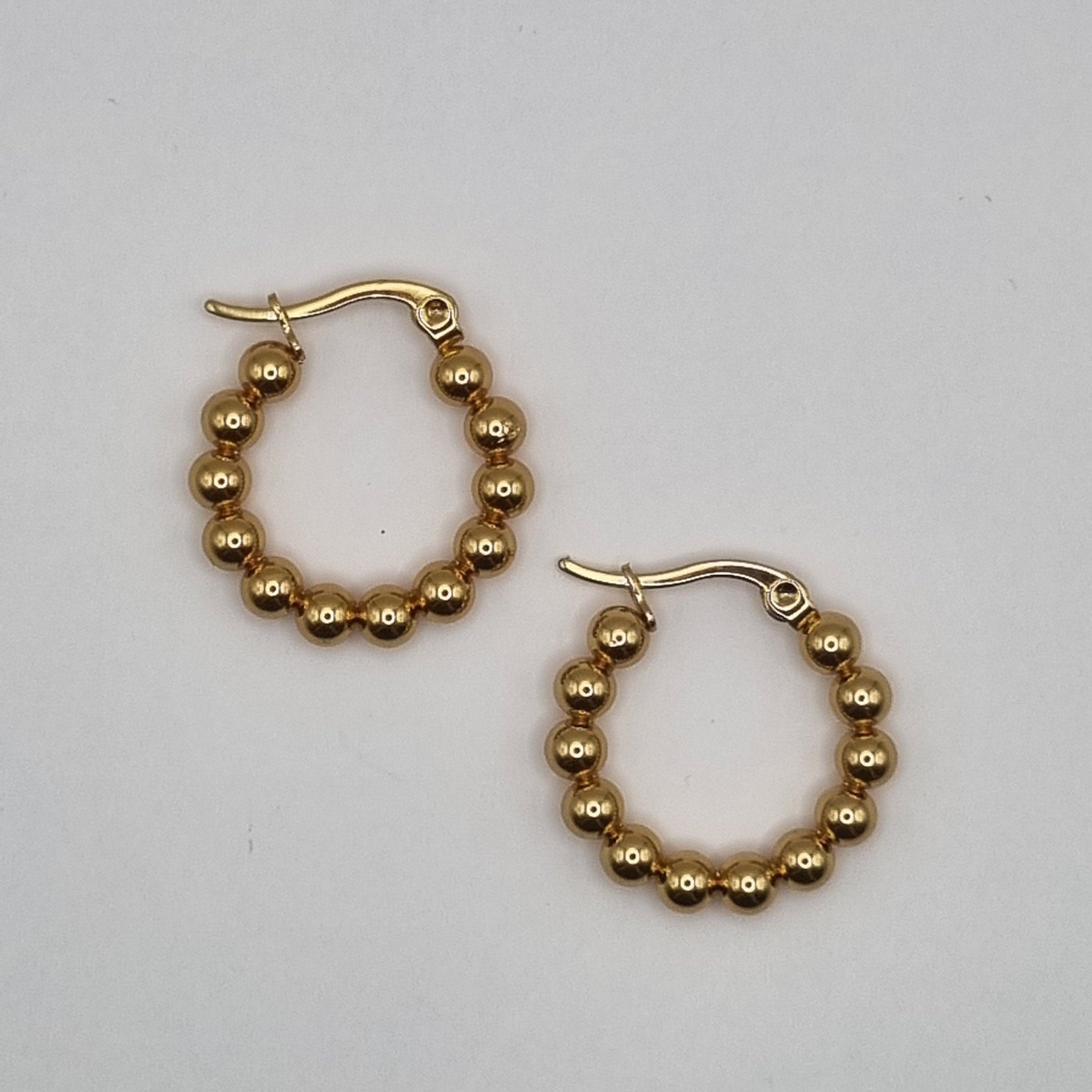 Creolen bolletjes RVS BY SANNE goud