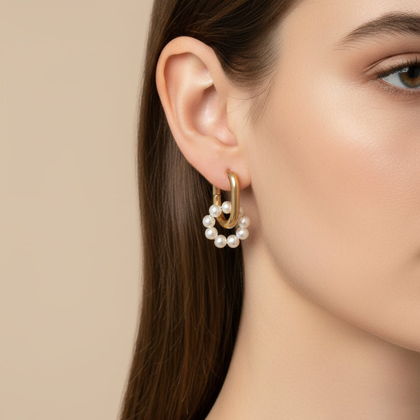 Oorbellen met bloem BY SANNE RVS goud parel