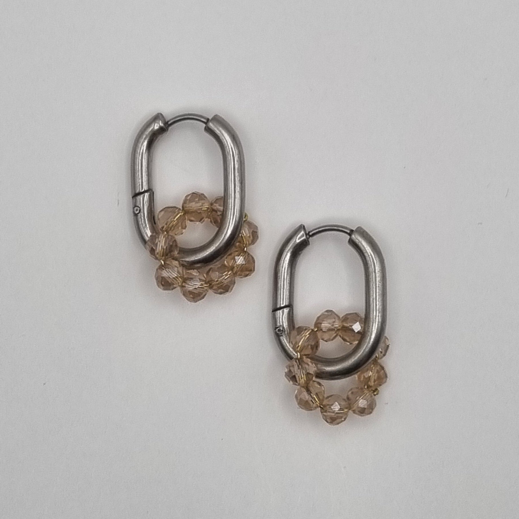 Oorbellen met bloem BY SANNE RVS zilver nude